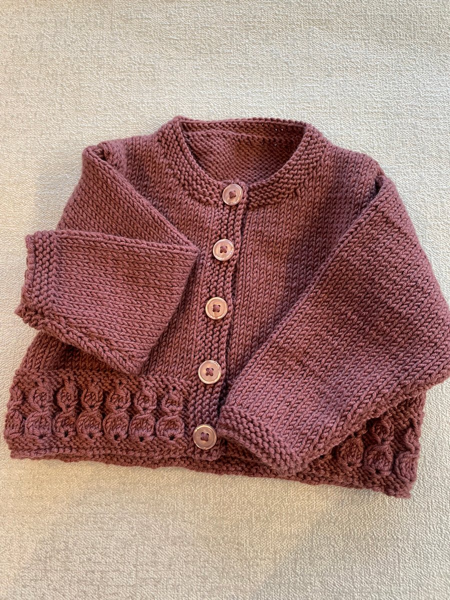 Baby cardigan with patterned border