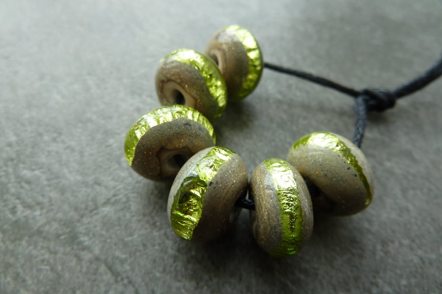 green sparkly wrapped lampwork glass beads