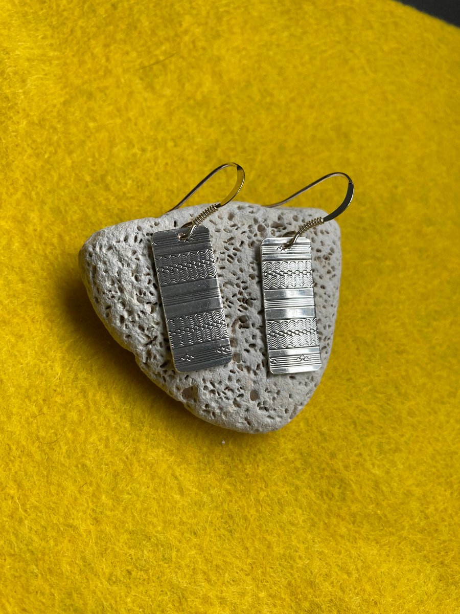 Silver earrings made from a Chester 1929 napkin ring