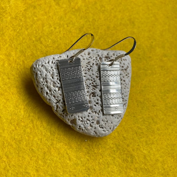 Silver earrings made from a Chester 1929 napkin ring