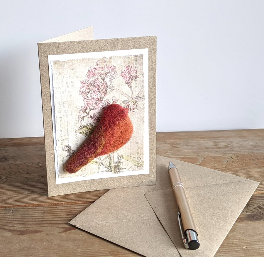 Brooch on a card - felted bird - reds and oranges