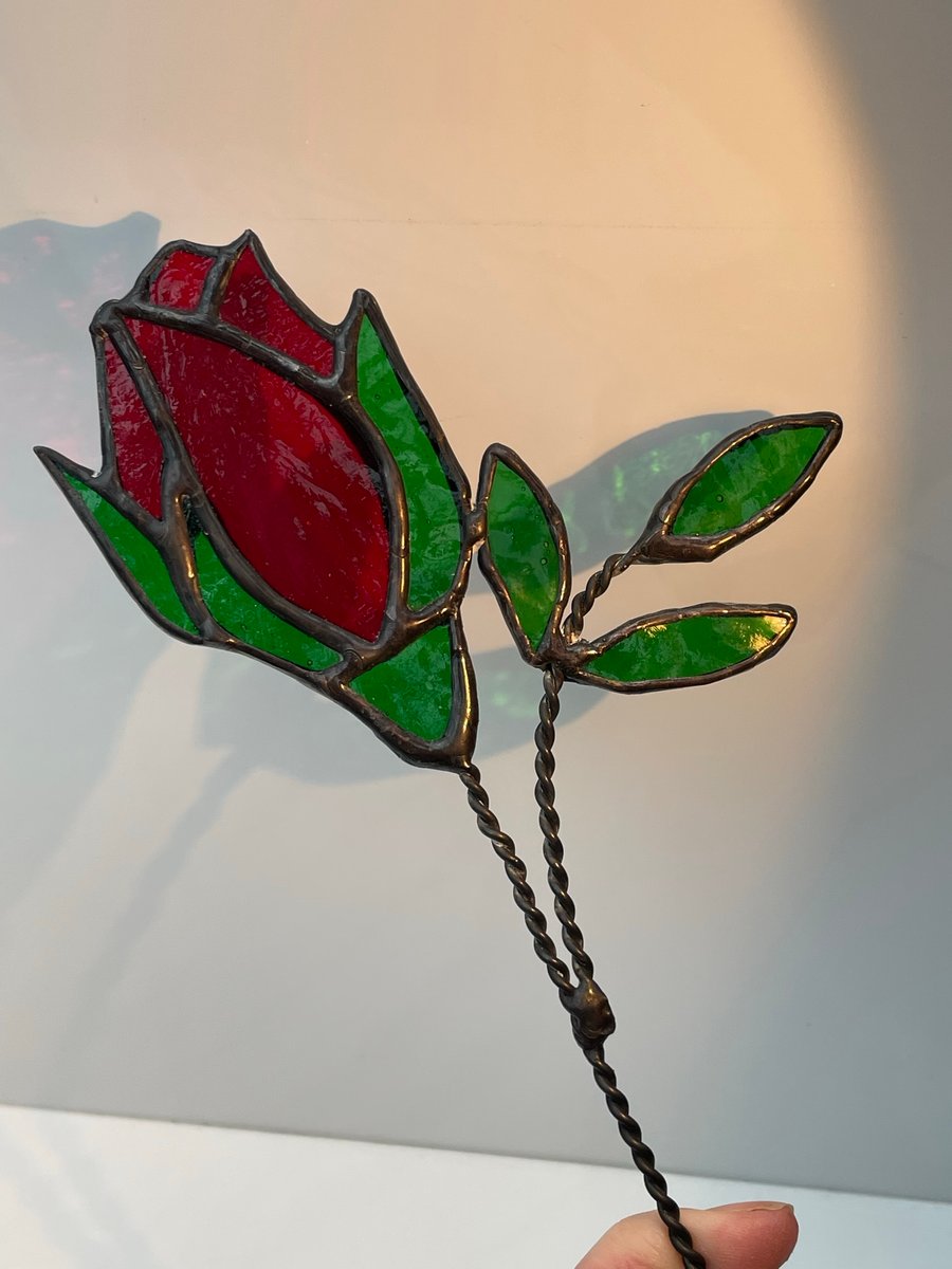 Stained glass red rose on long twisted wire stem 