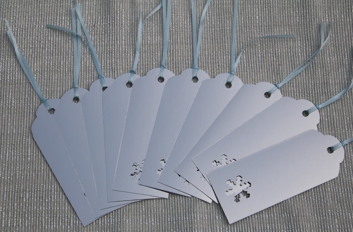 Bundle of 10 Christmas gift tags, silver foiled card with Snowflake aperture