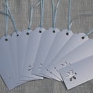 Bundle of 10 Christmas gift tags, silver foiled card with Snowflake aperture