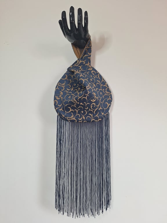 Navy with gold damask-style pattern Japanese Knot bag with 30cm tassel trim.