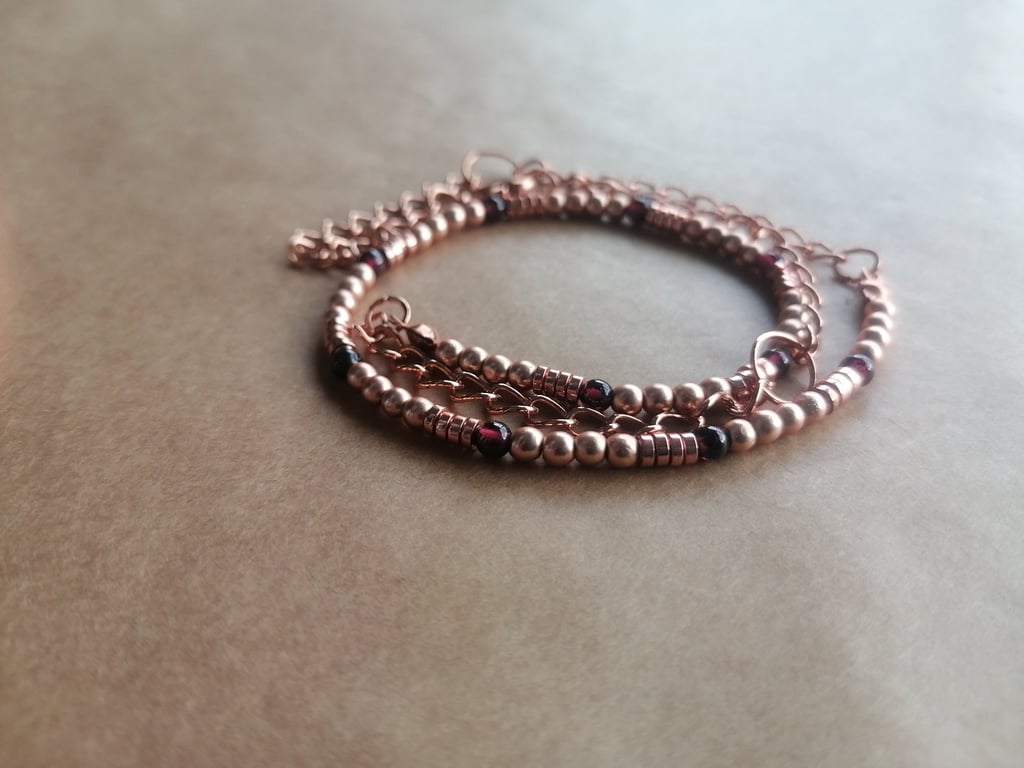 Garnet, hematite and rose ball necklace with a rose gold chain.