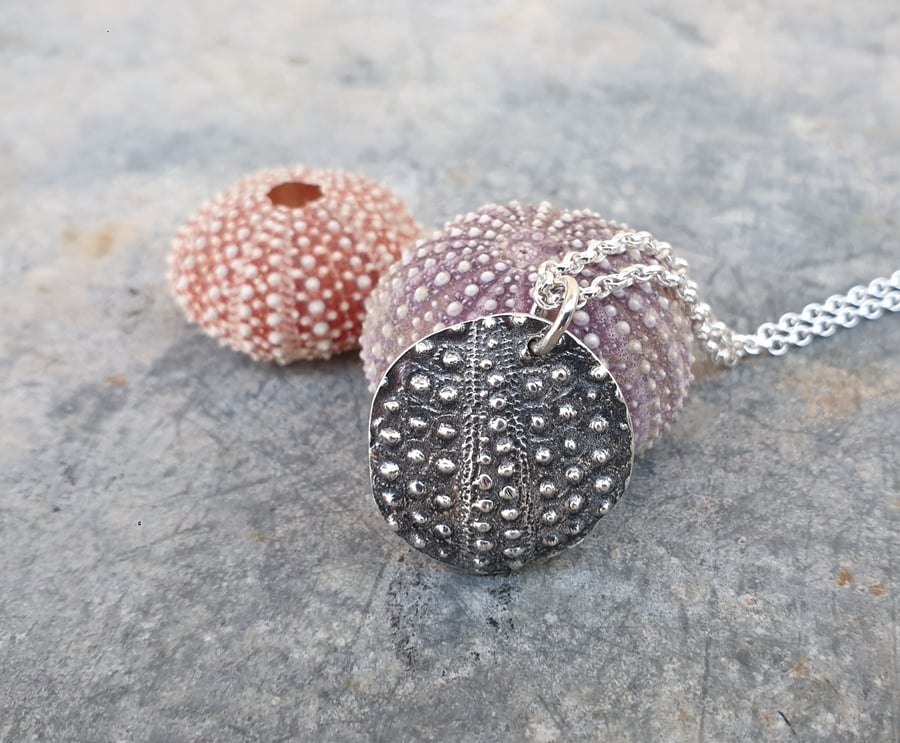 Silver sea urchin pendant