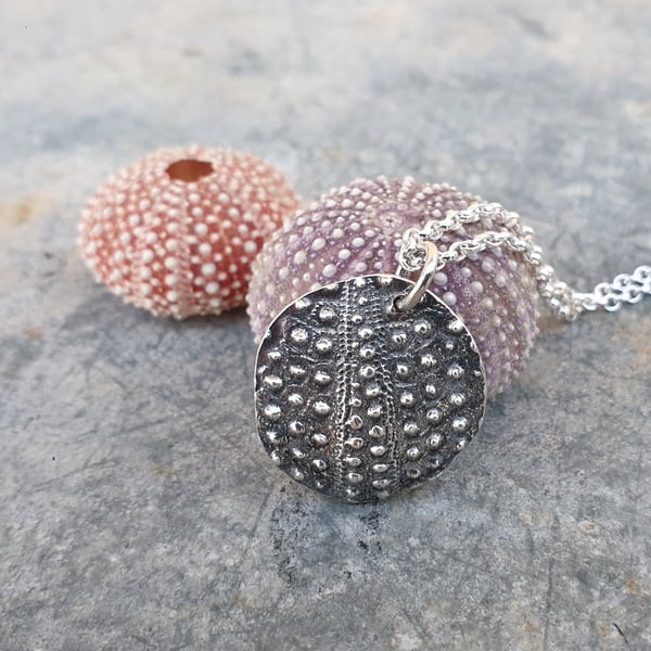 Silver sea urchin pendant