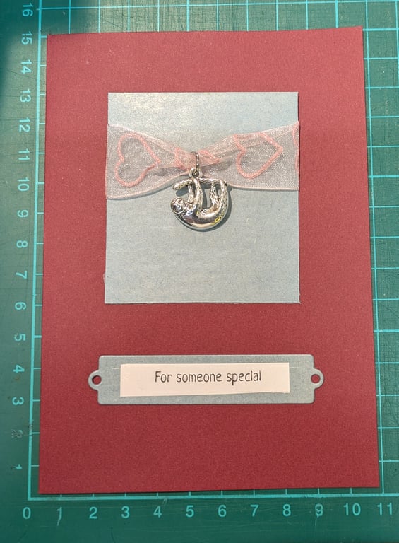 Card with metal sloth charm CH-4