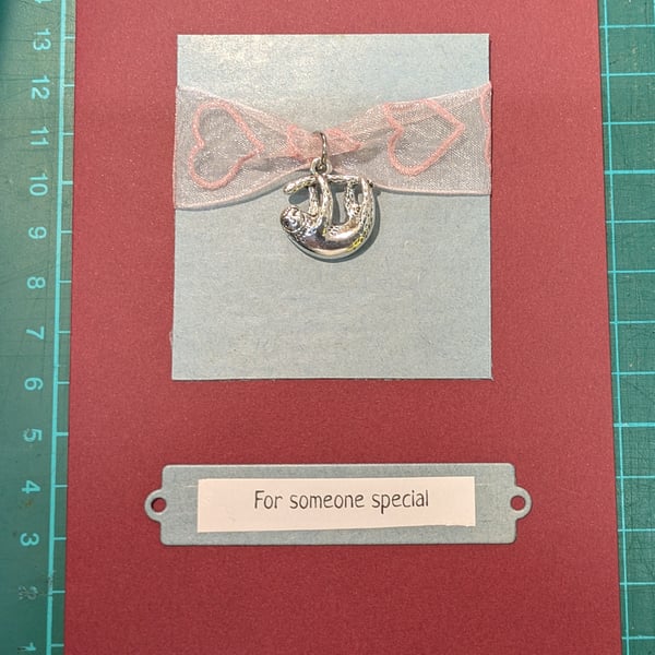 Card with metal sloth charm CH-4