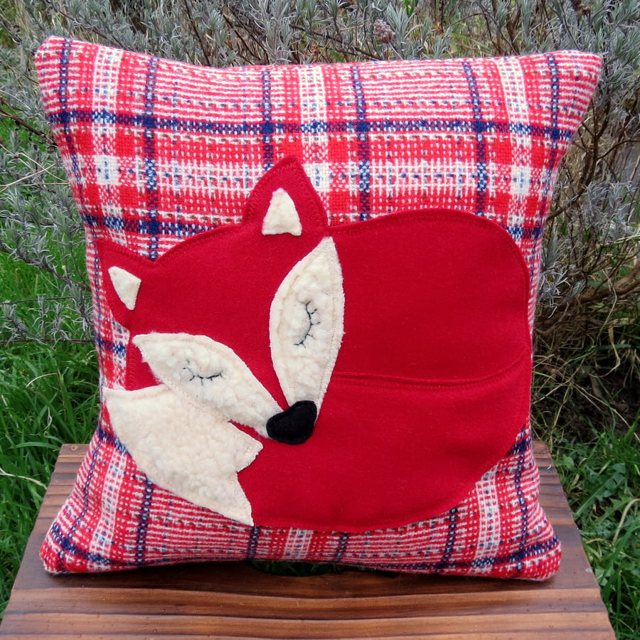A snoozy fox on tartan.  Fox cushion, complete with feather pad.