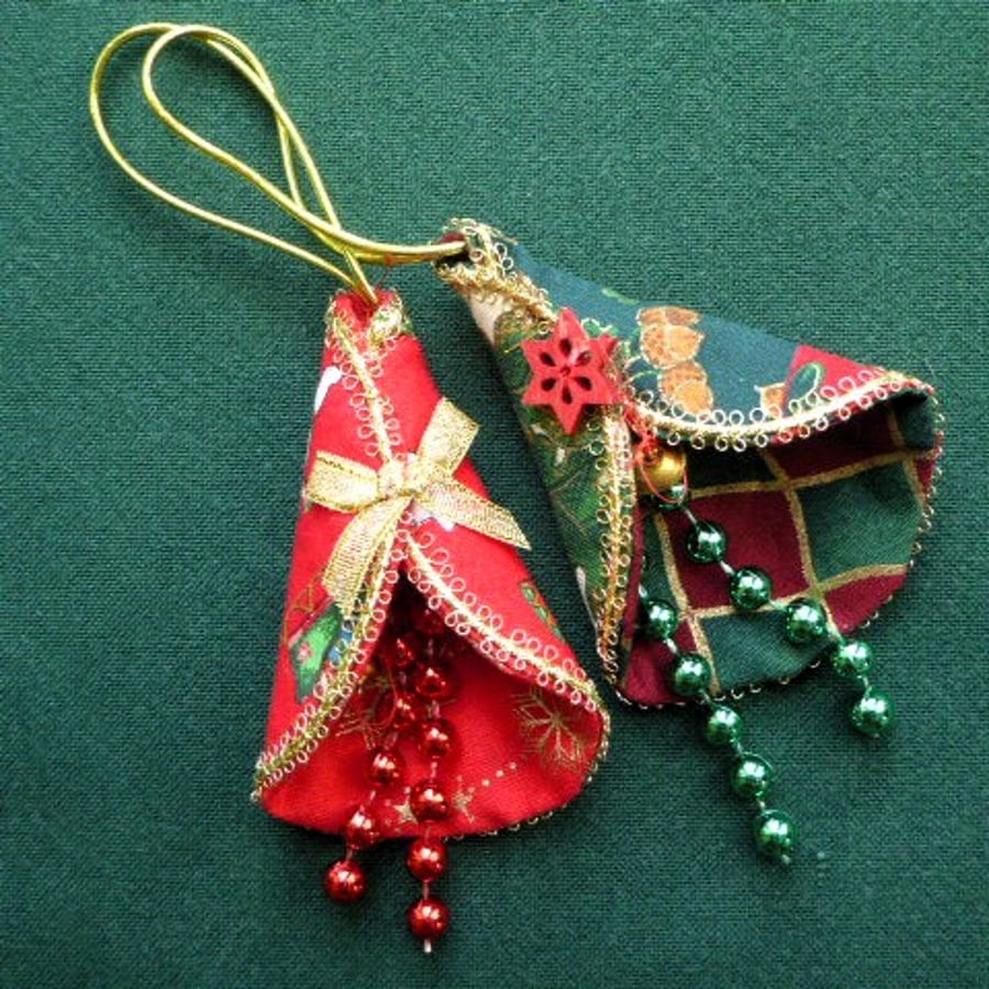 2 stitched textile hanging decorations