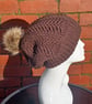 Chunky brown slouchy beanie hat with pompom