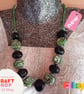 Statement necklace in green, black and silver polymer clay