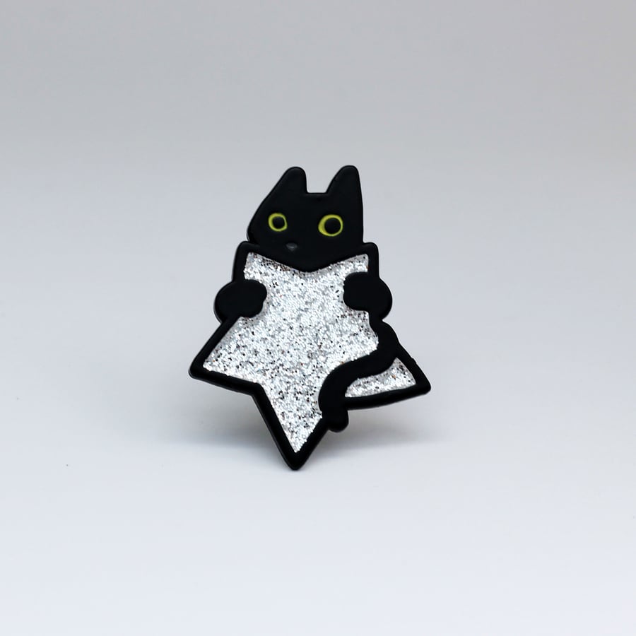 Black cat with glittery silver star pin, Sparkly enamel badge for cat lovers