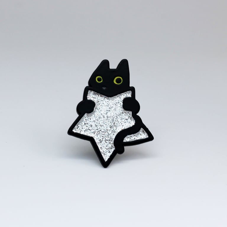 Black cat with glittery silver star pin, Sparkly enamel badge for cat lovers