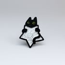 Black cat with glittery silver star pin, Sparkly enamel badge for cat lovers
