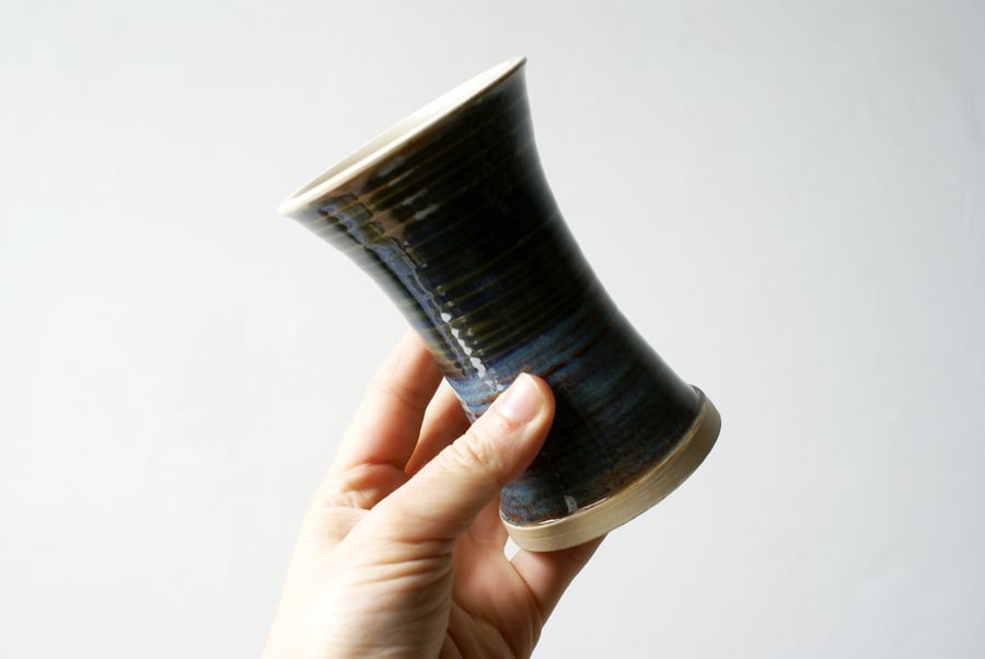 Sale - Hand thrown fluted bud vase glazed in shades of blue