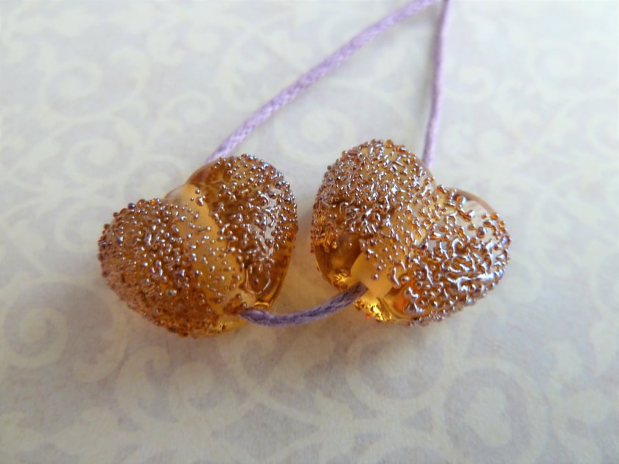 peach stardust lampwork glass heart beads