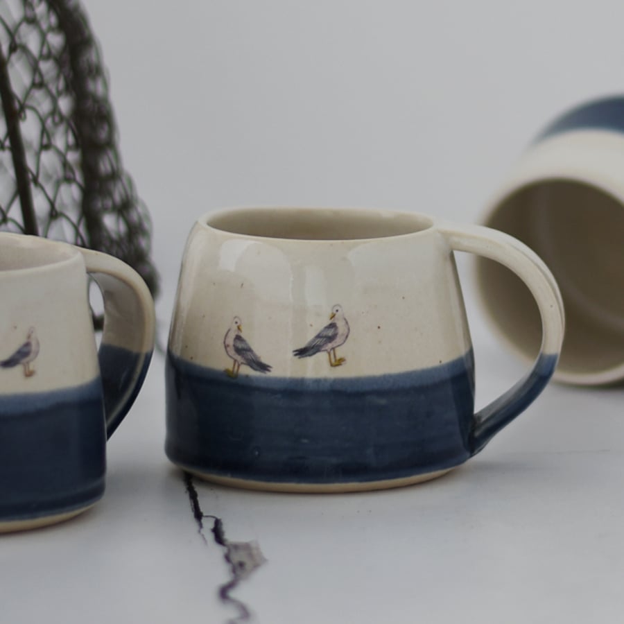 Blue and white ceramic mug with 2 tiny seagulls - handmade illustrated pottery