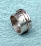 Silver Spinner or Fidget Ring - Textured Sterling Band With Moving Outer Ring  - Image 1