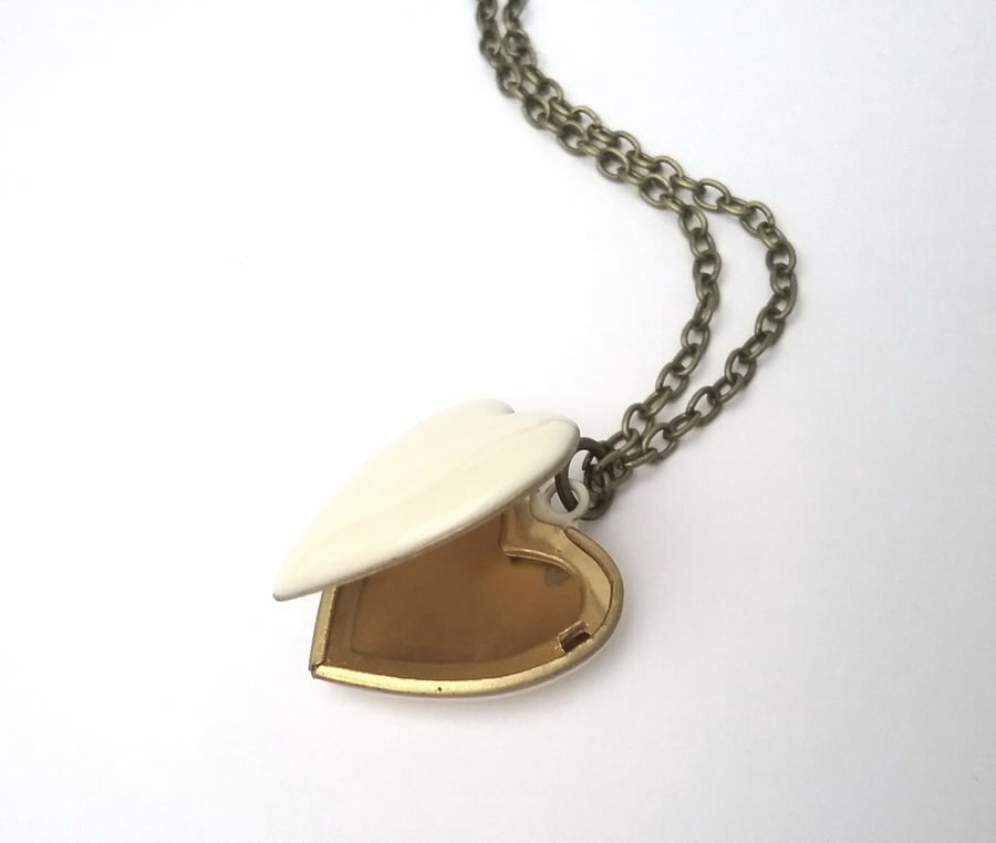 Ivory Enamel Heart Locket....