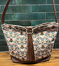 Bee Fabric and Leather Shoulder Bag