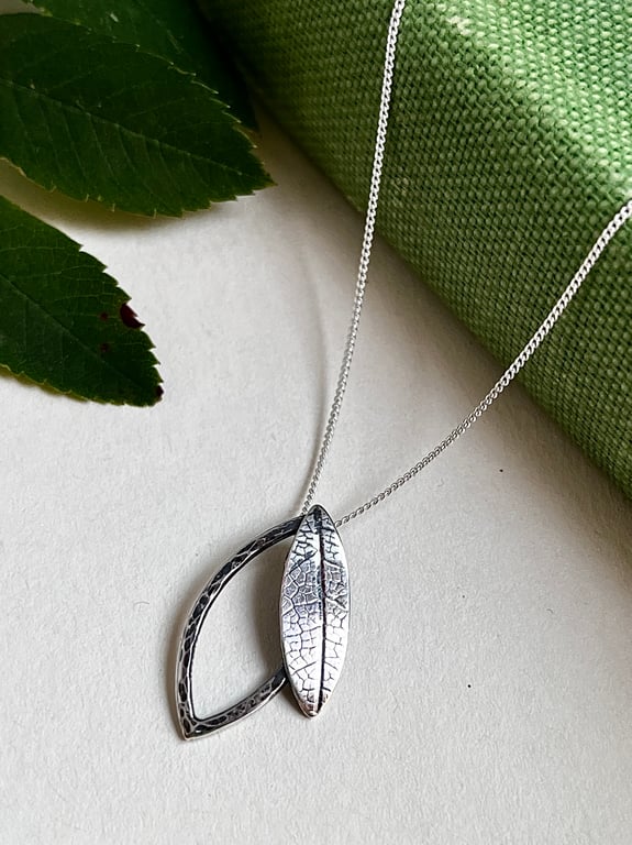 Double leaf sterling silver necklace pendant with printed and hammered texture