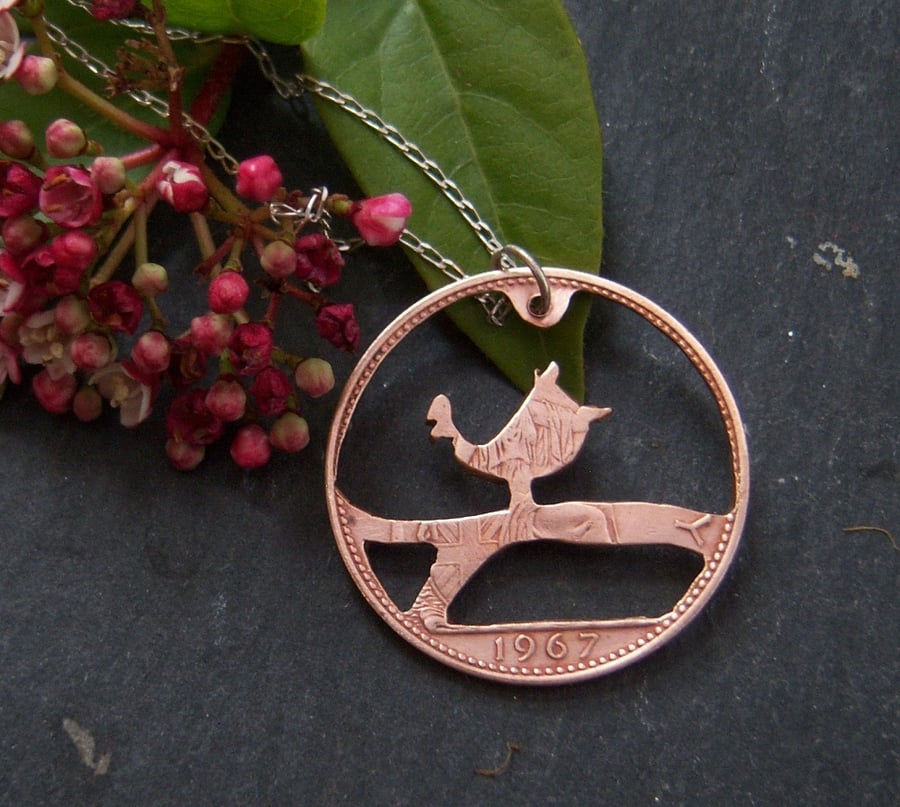 Bird on a branch pendant with sterling silver chain
