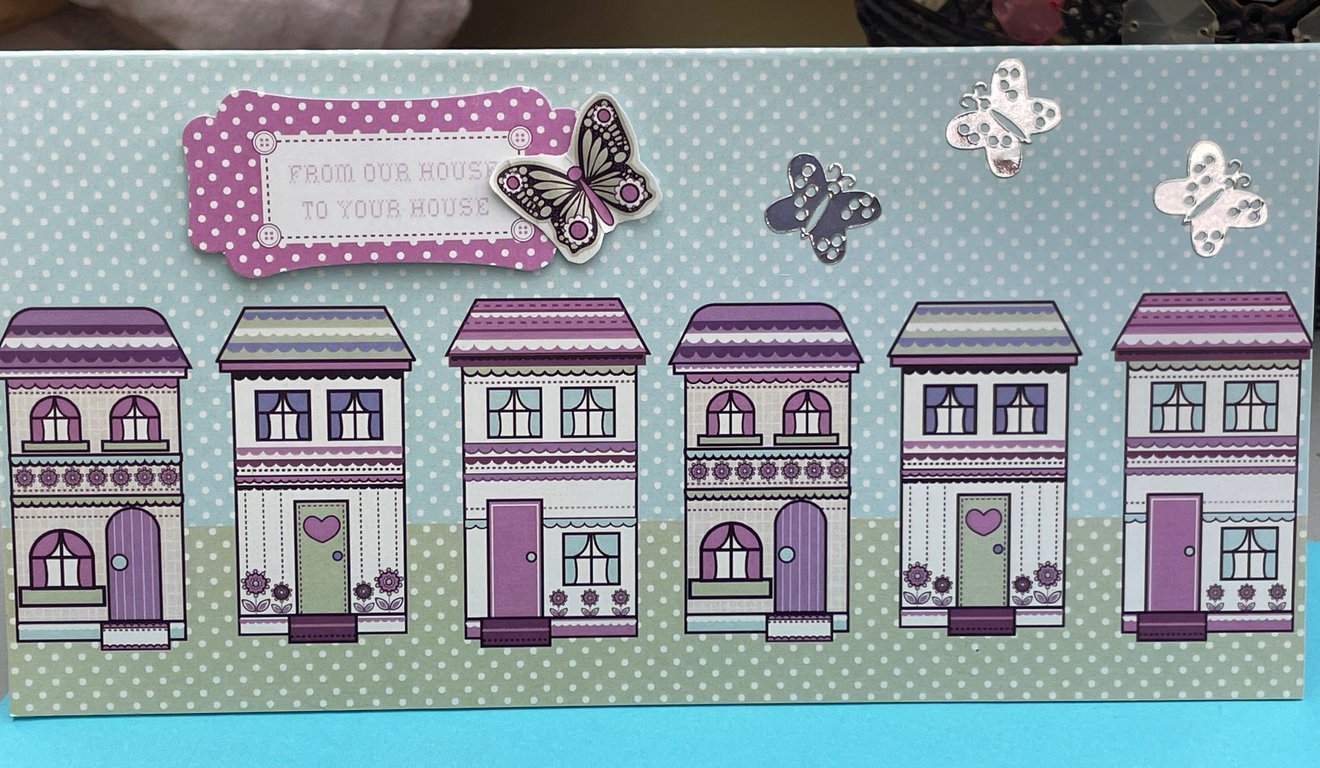 Cute street of houses new home card