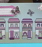 Cute street of houses new home card