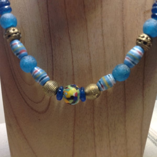 Bead necklace with large African handmade recycled glass and brass beads.
