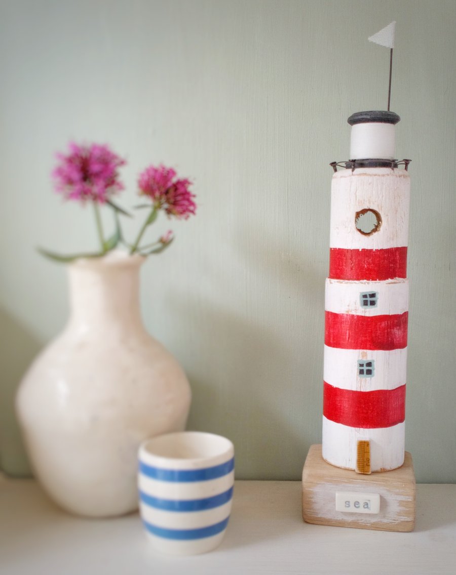 Lighthouse with vintage bobbin recycled wood 'sea' 