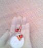 Earrings with Orange Artemis Beads Red and Black Beads on Long Chains - Image 3