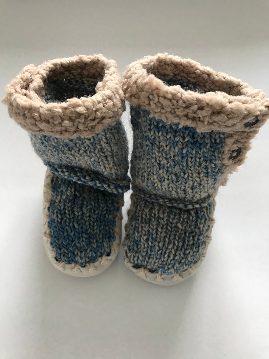 Hand knitted boots with fur lined soles