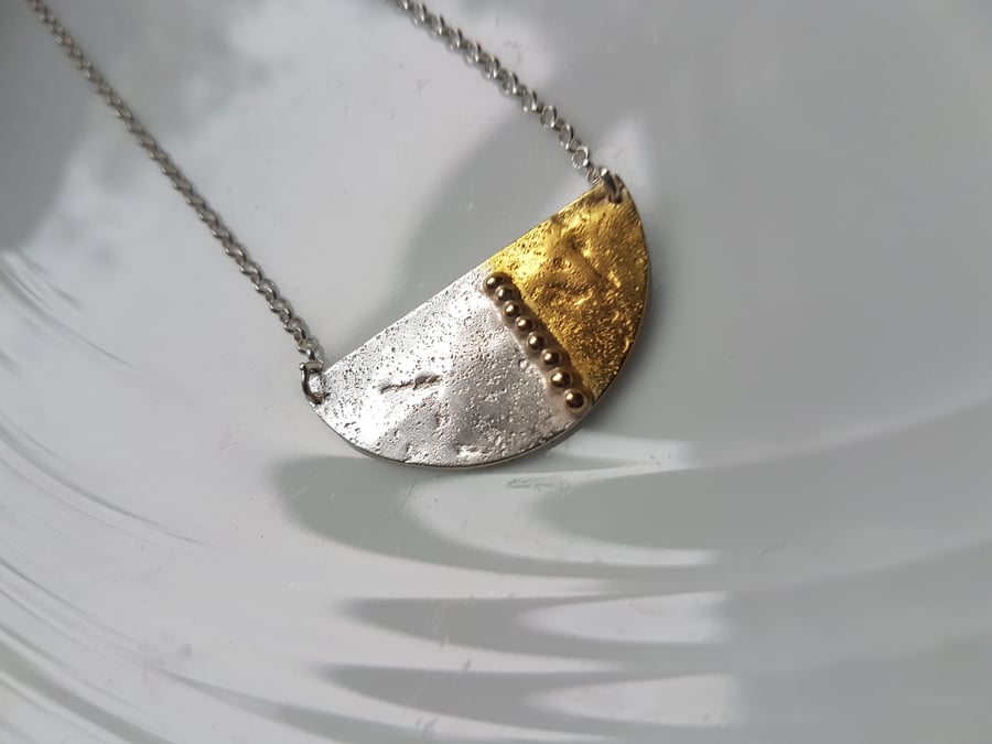 Contemporary sterling silver pendants with 9ct gold, handmade to order in Wales 
