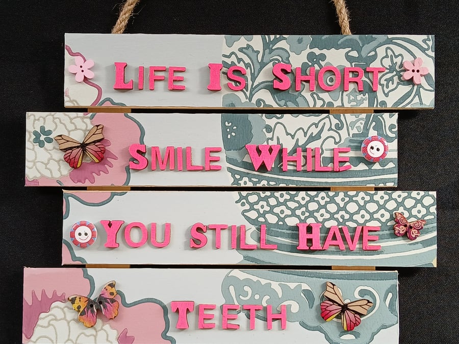 Hand decorated hanging wooden sign 