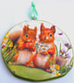 Red Squirrel decoupaged log slice wall decoration. - Image 4