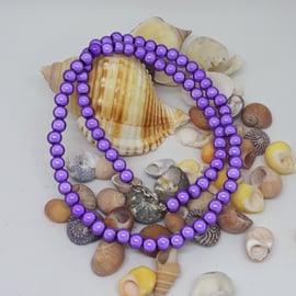 NL28- Purple miracle bead necklace