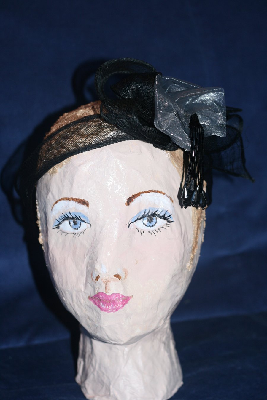 Black straw headband with grey silk rose