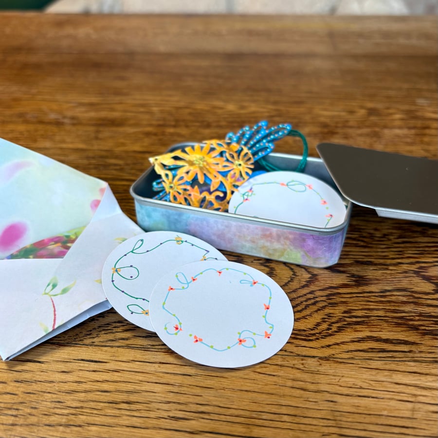 Selection of hand painted magnets and ephemera in a tin Hearts & Birds 1