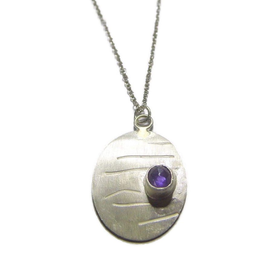 Handmade oval sterling silver pendant with rose cut amethyst
