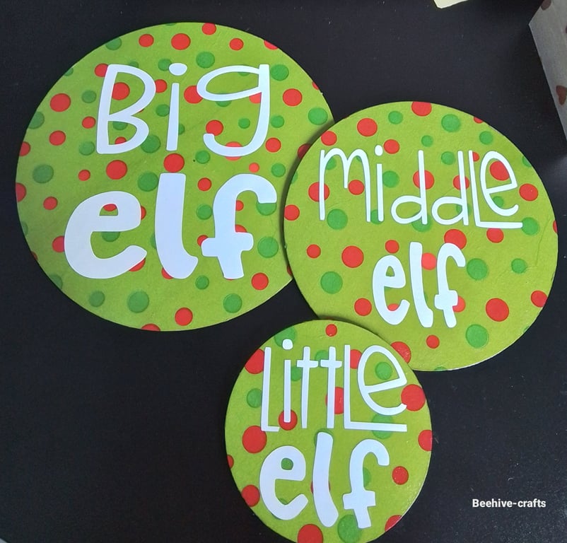 Wooden elf coaster trio