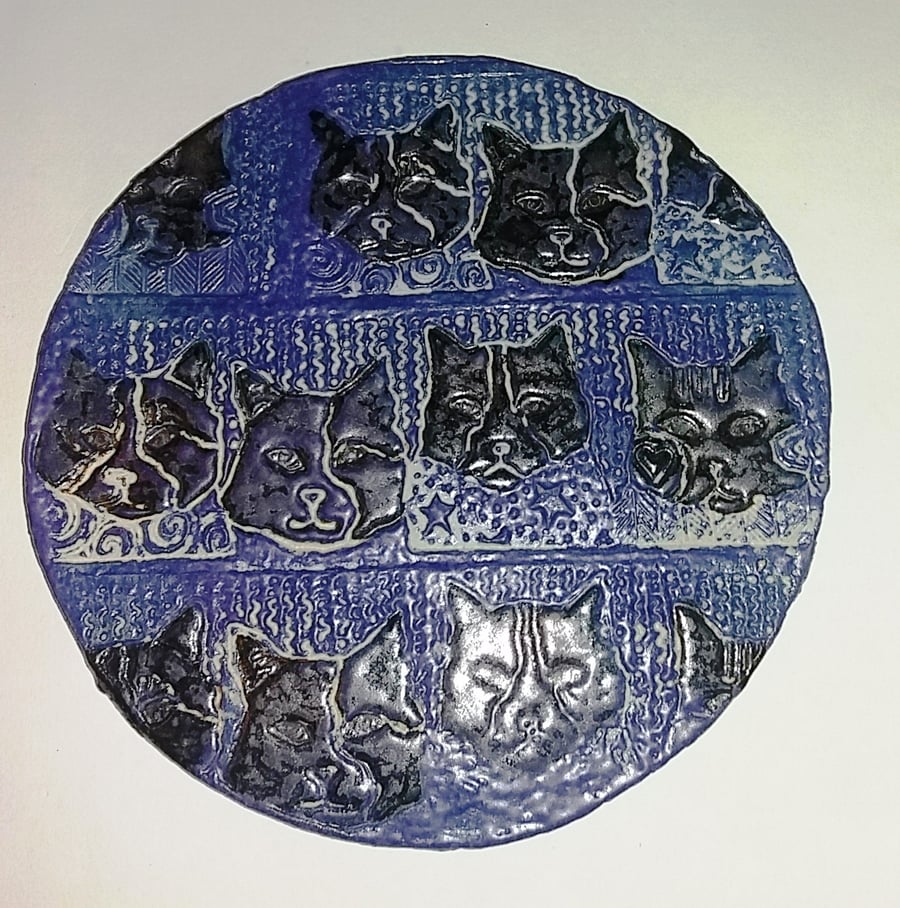 Cat faces, stoneware, hotplates