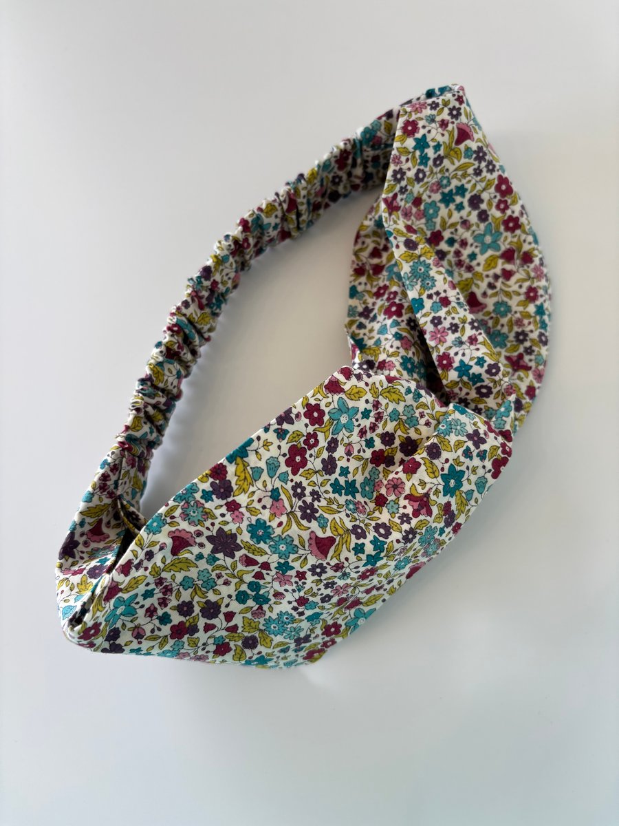 Cotton headband, twist knot style hairband in autumnal colours floral print.