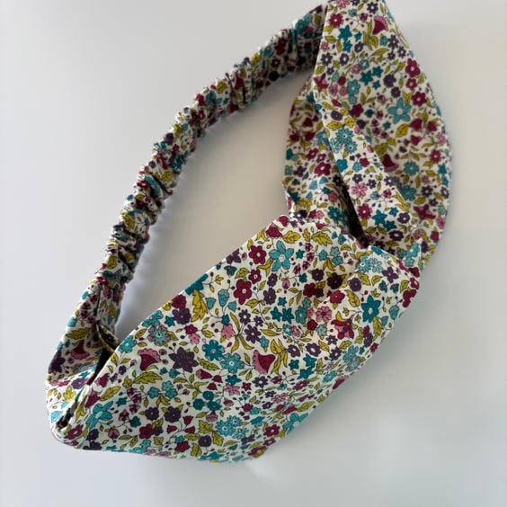 Cotton headband, twist knot style hairband in autumnal colours floral print.