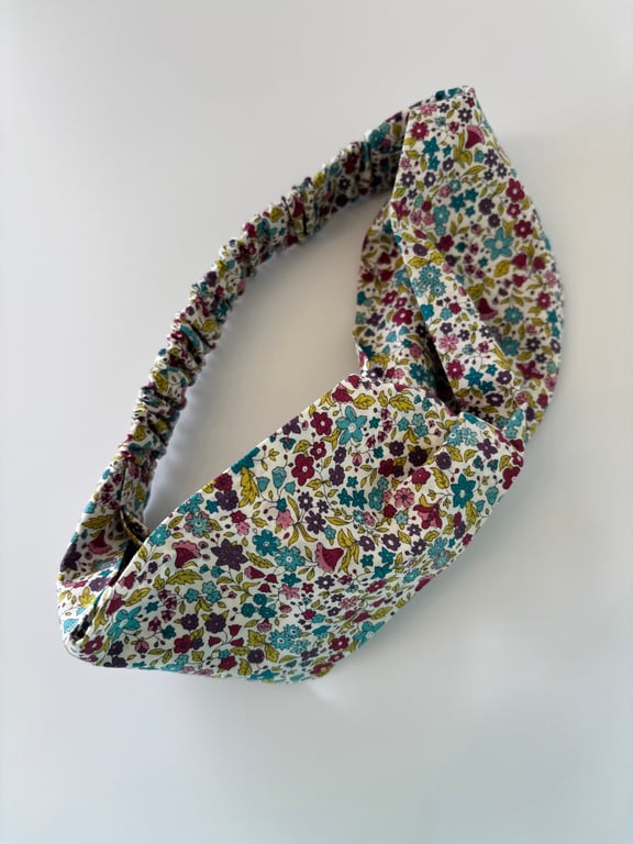Cotton headband, twist knot style hairband in autumnal colours floral print.
