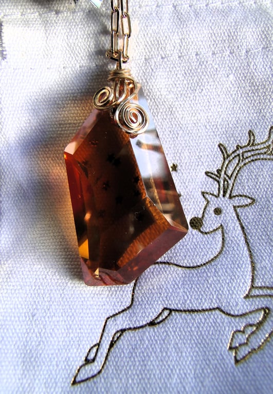 Wire wrapped copper coloured Swarovski Crystal Pendant on a gold chain Rare