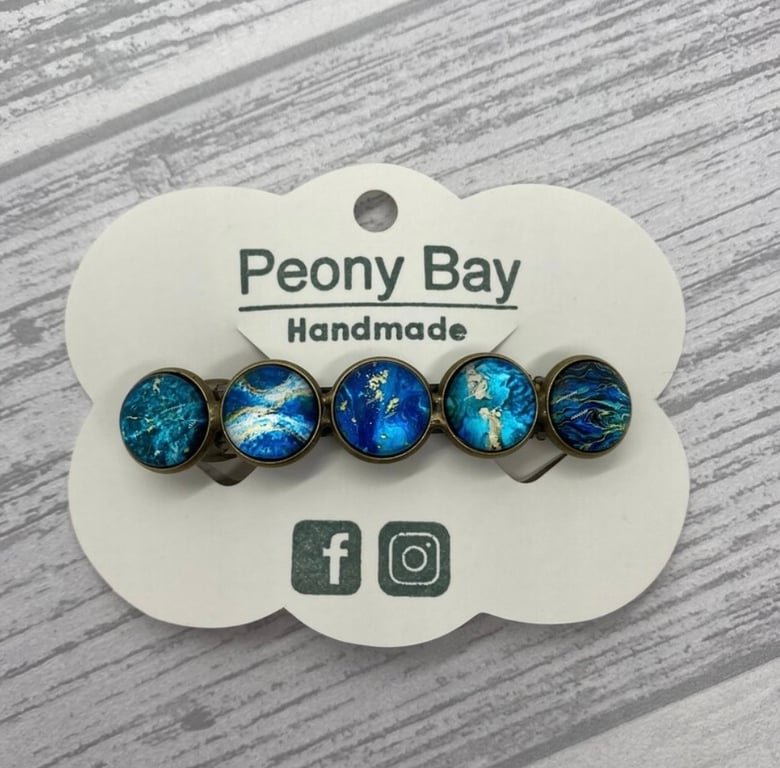 Women's barrette in blue and gold
