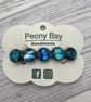 Women's barrette in blue and gold